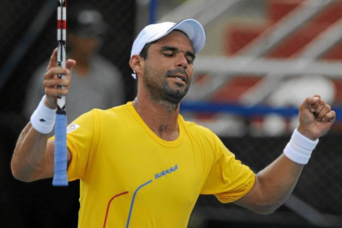 Alejandro Falla le dio dos puntos a Colombia en el enfrentamiento de la Copa Davis, al derrotar a Ariel Behar y a Rodrigo Senattore, sin ceder ningún set. (Foto: AFP / VANGUARDIA LIBERAL)