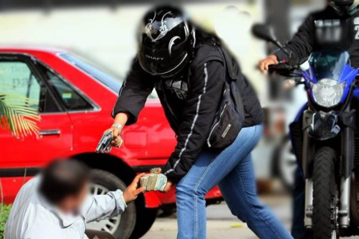 La Policía buscó por el sector a los delincuentes quienes lograron darse a la fuga con los $4 millones que le hurtaron al comerciante.(Foto: Nelson Díaz/VANGUARDIA LIBERAL)