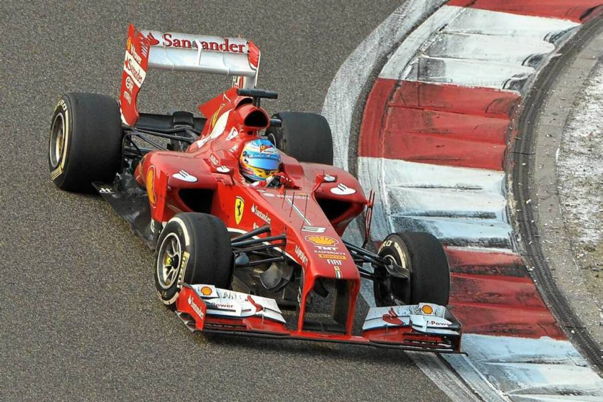 El español Fernando Alonso, piloto de la escudería Ferrari, ganó ayer el Gran Premio de China, logrando su primera victoria de esta temporada y la 31ª de su trayectoria en la Fórmula Uno. (Foto: AFP / VANGUARDIA LIBERAL )