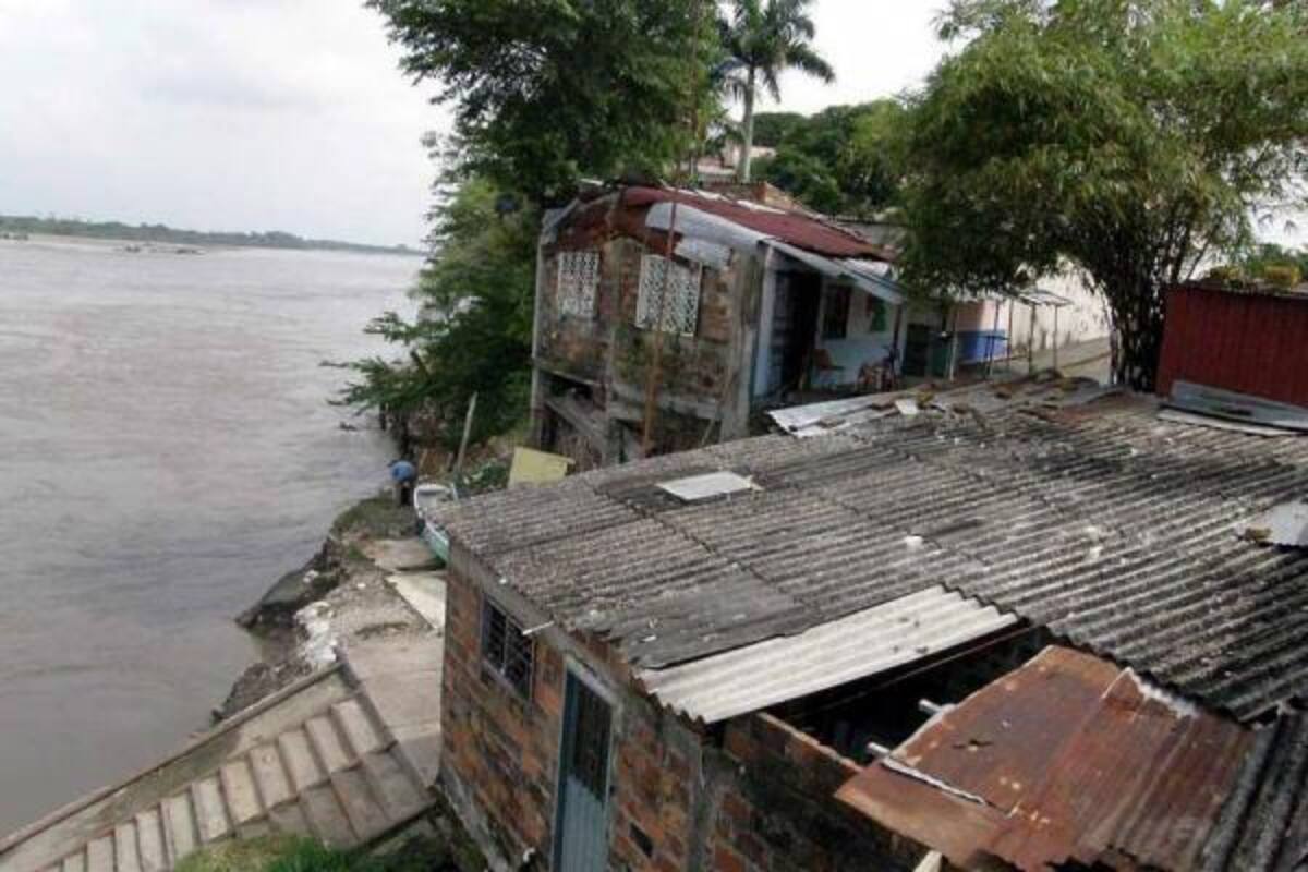 En pocos meses se cumplen tres años desde que el cauce del río Magdalena arrasó con negocios y viviendas de Puerto Playas y Puerto Águila, en el sector del muelle. Algunas de las familias afectadas no se han dejado vencer por la tragedia y están a punto de hacer realidad un proyecto turístico.(Foto: Edgar Pernett/VANGUARDIA LIBERAL)