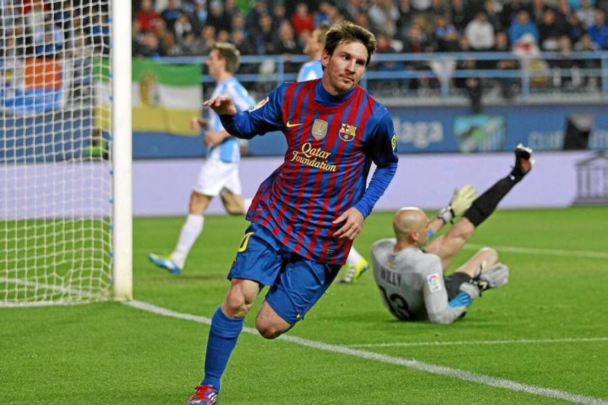El argentino Lionel Messi guió de manera magistral, y anotando tres goles, al Barcelona a una nueva victoria en la Liga Española, al derrotar 4 – 1 al Málaga, pero no le sirvió para descontar la diferencia de cinco puntos con el Real Madrid en la tabla de posiciones, pues los ‘merengues’ ganaron por idéntico marcador al Bilbao. (Foto: AFP / VANGUARDIA LIBERAL)