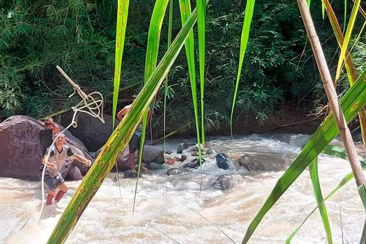 Rescatistas de Defensa Civil hallaron el cuerpo de la niña sobre unas rocas en medio del río Cáchira/ Foto: suministrada.
