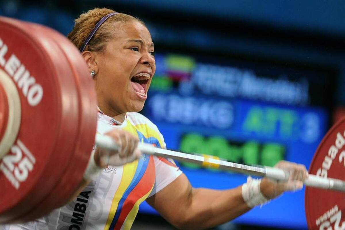 Mercedes Isabel Pérez, integrante de la Liga Santandereana de Pesas, ganó el oro en los 69 kilos del levantamiento de pesas en los Juegos Panamericanos 2011 e impuso un nuevo récord continental en envión. Además se aseguró un cupo en los Juegos Olímpicos de Londres 2012. (Foto: AFP / VANGUARDIA LIBERAL )