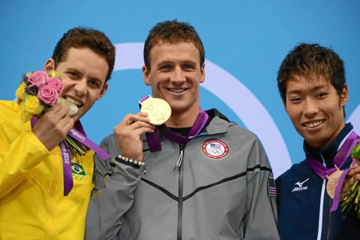 Por primera vez, desde Sídney 200, un podio olímpico de natación no tuvo a Michael Phelps en el podio, la ‘Bala’ de Baltimore terminó cuarto en la prueba de los 400 metros estilos, la cual dejó como medallistas Ryan Lochte (oro), el brasileño Thiago Pereira (plata) y el japonés Kosuke Hagino (bronce). (Foto: AFP / VANGUARDIA LIBERAL)