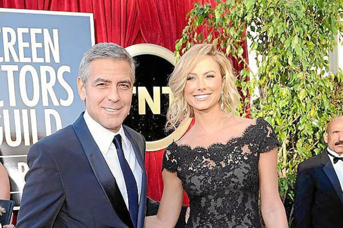 George Clooney, siempre elegante y caballeroso, se dejó ver impecable junto a su novia, Stacy Keibler.