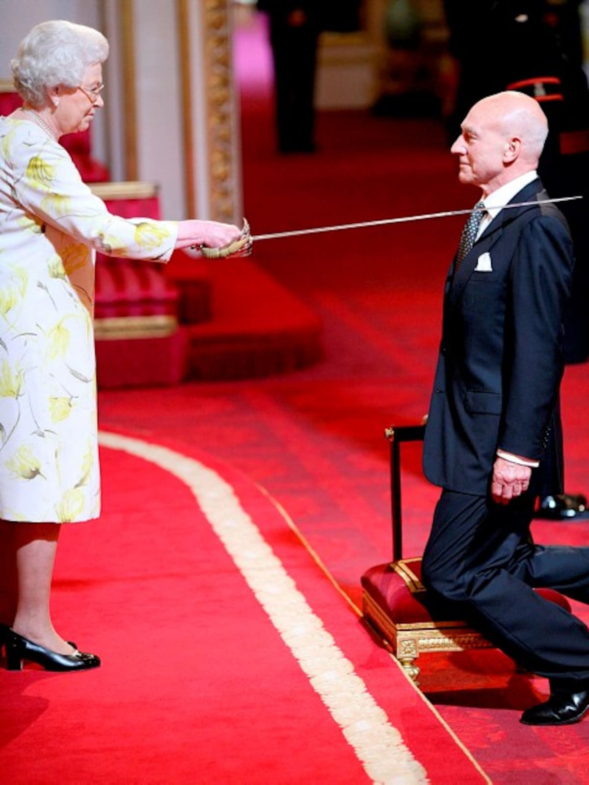 Actor Sir Patrick Stewart is knighted by Britain's Queen Elizabeth II during an investiture at Buckingham Palace in London, Wednesday June 2, 2010. The Queen is reported to be a fan of the star, who has enjoyed a 50-year career in movies, TV and the theatre including 16 years with the Royal Shakespeare Company.(AP Photo/Anthony Devlin-pa) **UNITED KINGDOM OUT: NO SALES: NO ARCHIVE:**