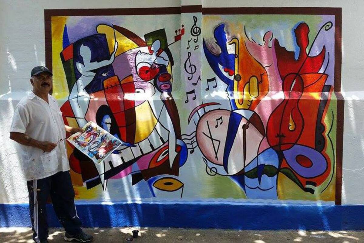 Jamez de Girón realizó la obra denominada “Más Música, Menos Violencia”, en la Sede B del Colegio Nieves Cortés Picón. (Foto: Suministrada/VANGUARDIA LIBERAL)