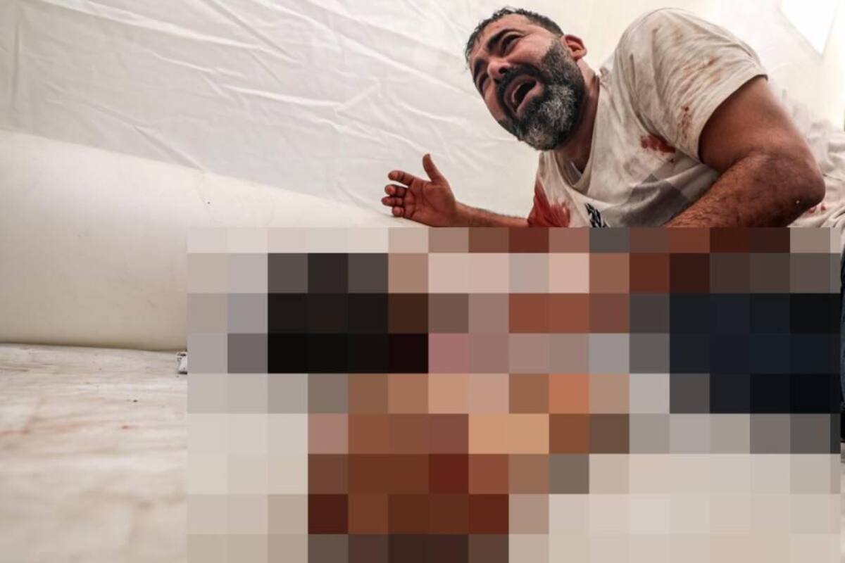 Un palestino llora el cuerpo de su hijo muerto en el hospital Al-Shifa después de un ataque aéreo israelí en Gaza. EFE / VANGUARDIA