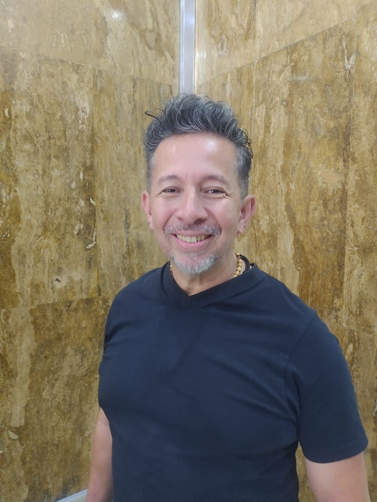 Carlos J. Benavides.