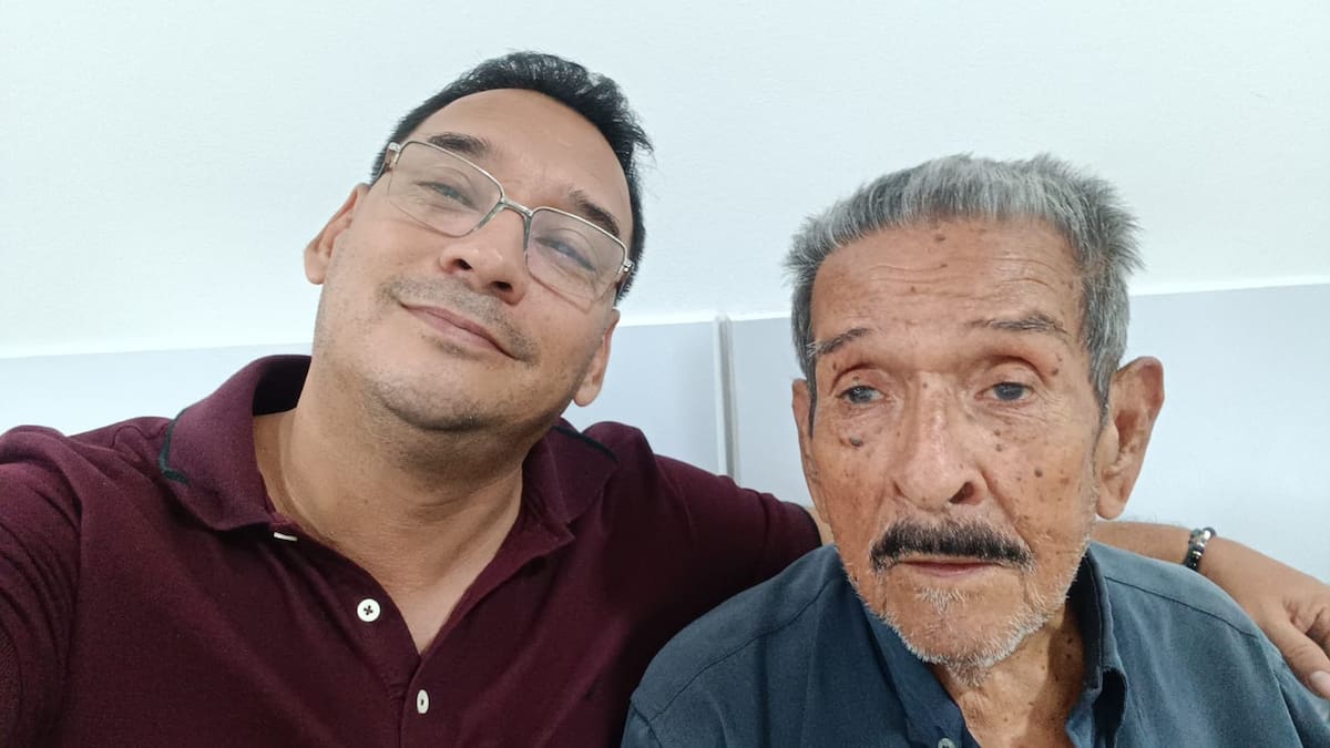 Domingo Cáceres, (q.e.p.) junto a su hijo, Ronald Cáceres.