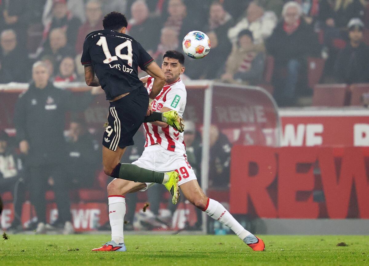 Cologne (Germany), 14/01/2026.- Luis Diaz of Bayern Munich (L) and Cenk Oezkacar of Cologne (R) in action during the German Bundesliga soccer match between 1. FC Cologne and Bayern Munich, in Cologne, Germany, 14 January 2026. (Alemania, Colonia) EFE/EPA/FRIEDEMANN VOGEL CONDITIONS - ATTENTION: The DFL regulations prohibit any use of photographs as image sequences and/or quasi-video.