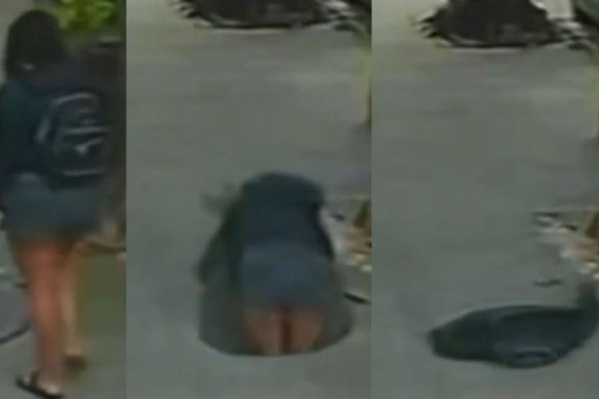 En Río de Janeiro, Brasil, una mujer vivió un momento aterrador tras caer en una alcantarilla que había sido manipulada horas antes por sujetos que intentaron robar cables.