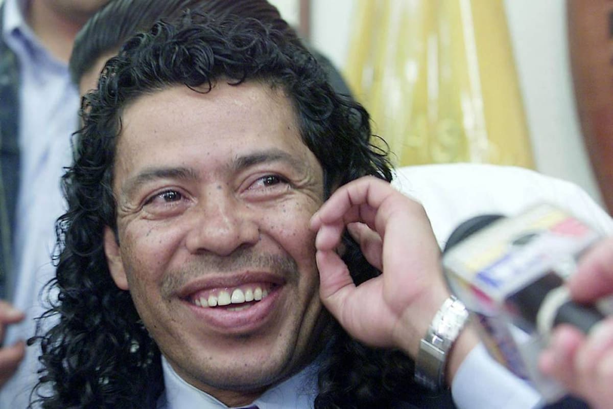 Colombian goalkeeper Rene Higuita speaks during a press conference in Quito, 24 November 2004. Higuita was dismissed of Ecuadorean Aucas club, after a dope test was positive. AFP PHOTO/Rodrigo BUENDIA