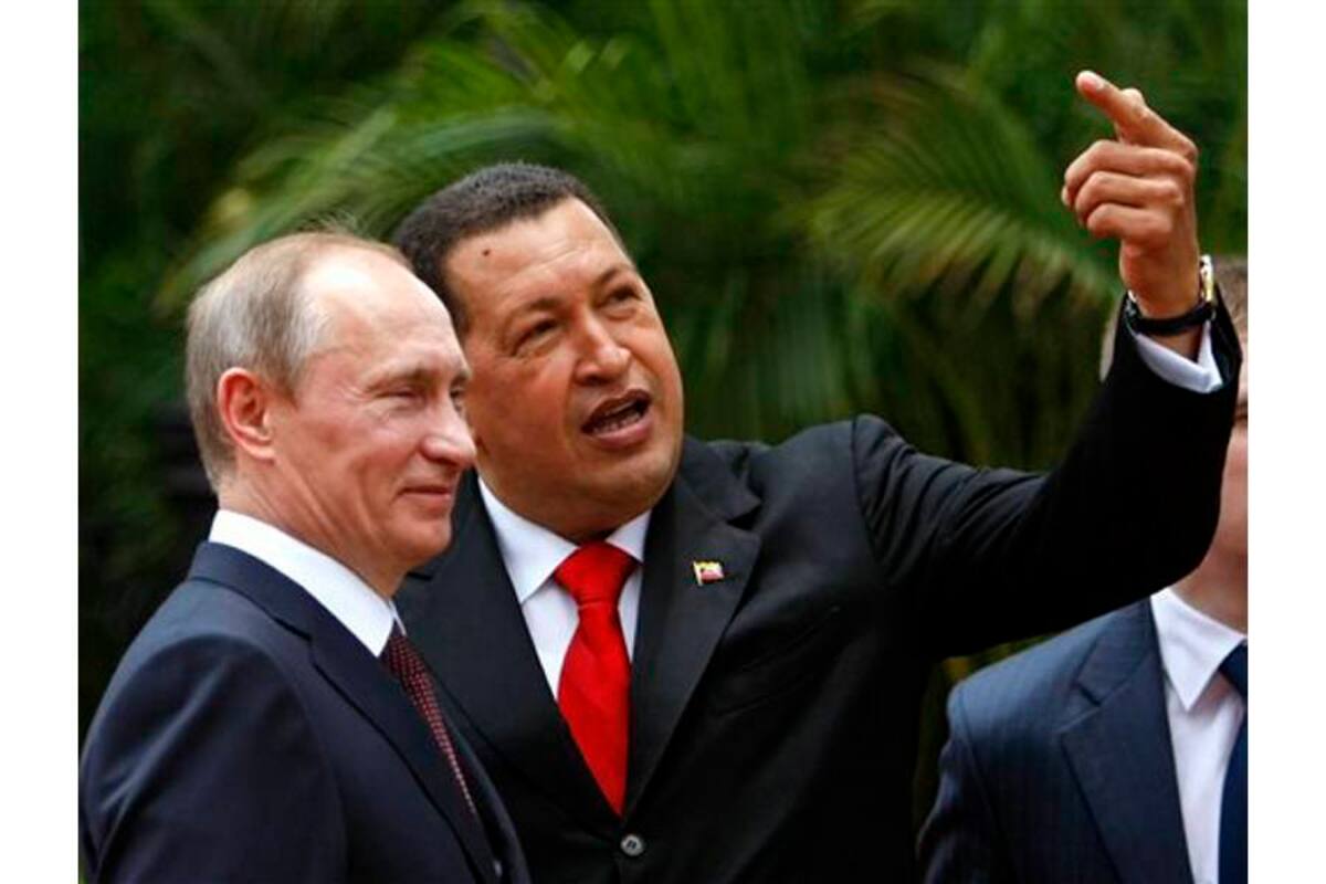 Putin y Chávez entablaron una sólida relación comercial enfocada en el sector petrolero y energético. En septiembre pasado, Sechin, en otra visita a Venezuela, entregó a Chávez otro obsequio de Putin: un cachorro de tres meses de la raza terrier ruso negro. (Foto: AFP / VANGUARDIA LIBERAL)