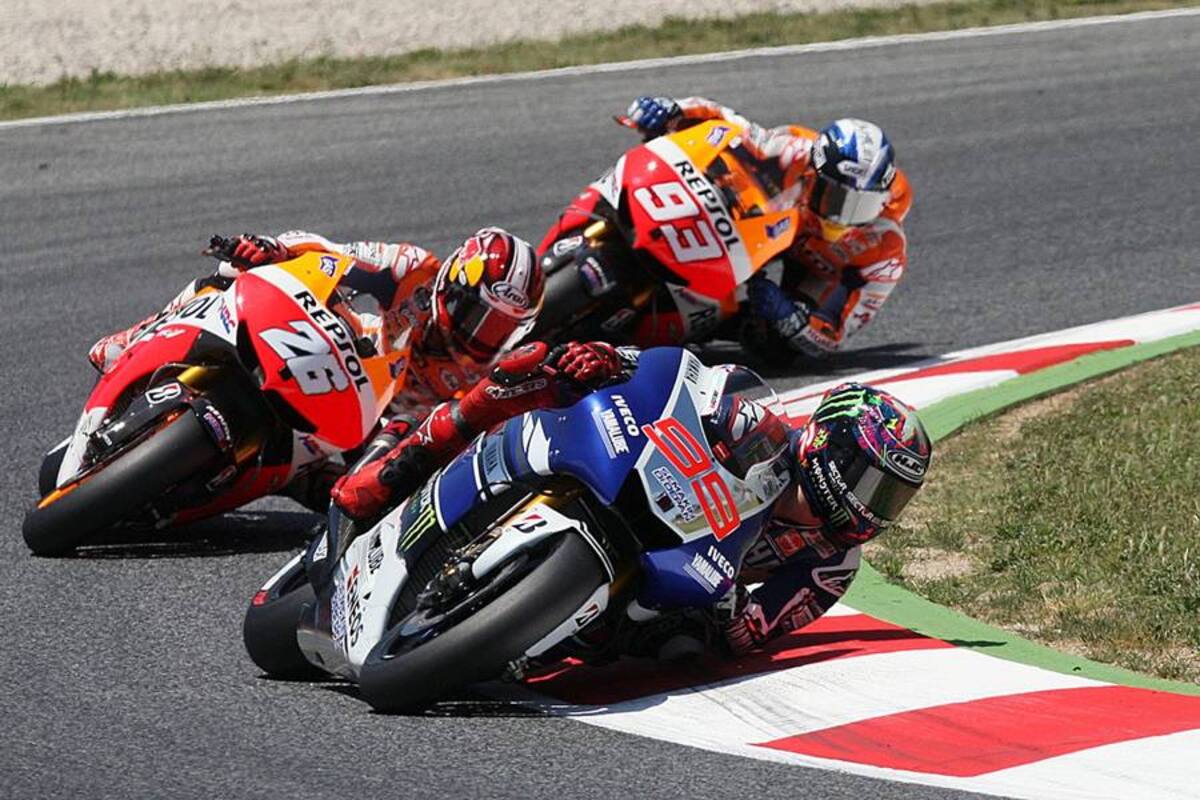 El español Jorge Lorenzo (Yamaha) encadenó su segunda victoria (tercera de la temporada en MotoGP), al ganar con enorme autoridad el Gran Premio de Cataluña, aunque su compatriota Dani Pedrosa (Repsol-Honda) mantuvo el liderato del Mundial. (Foto: AFP / VANGUARDIA LIBERAL)