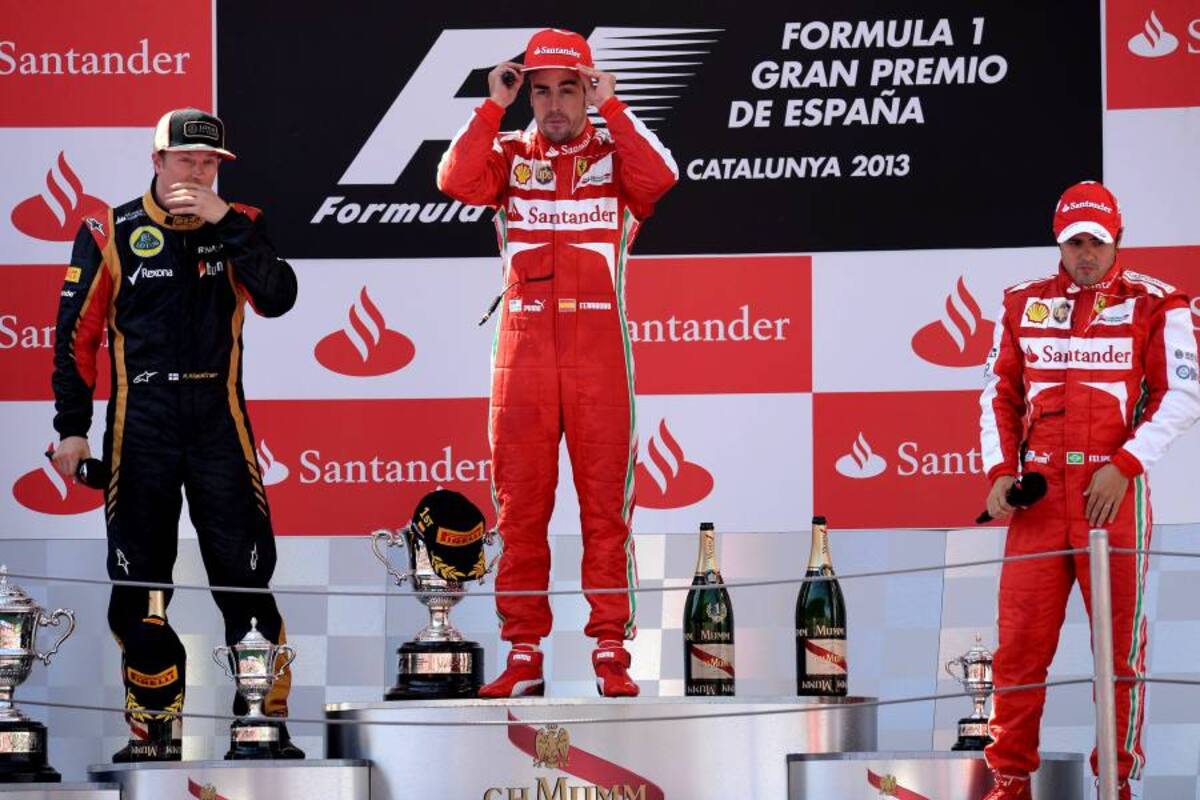 El español Fernando Alonso se impuso en el Gran Premio de su país, secundado por el finlandés Kimi Räikkönen y el brasileño Felipe Massa, permitiéndole a los tres, descontarle puntos al líder de la Fórmula Uno, el alemán Sebastián Vettel, quien cruzó la meta en cuarto lugar. (Foto: AFP / VANGUARDIA LIBERAL)
