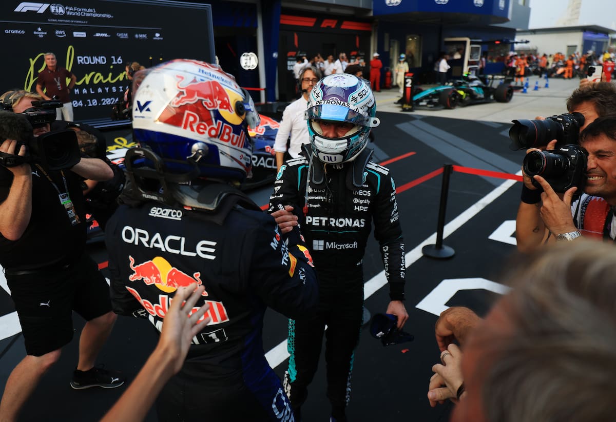 SEPANG (Malaysia), 04/10/2026.- First place Red Bull Racing driver Max Verstappen (L) of Netherlands celebrates with second placed Mercedes driver Andrea Kimi Antonelli (C) of Italy after winning in the 2026 Formula 1 Bahrain Grand Prix at the Sepang International Circuit in Malaysia, in Sepang, Malaysia, 04 October 2026. (Fórmula Uno, Bahrein, Italia, Malasia, Países Bajos; Holanda) EFE/EPA/FAZRY ISMAIL