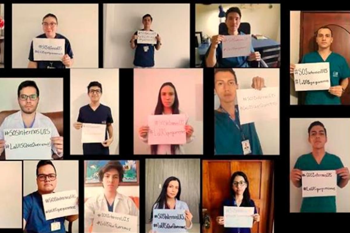 Con carteles en manos, ellos dicen: “S0S, la vocación no nos protege del virus”.