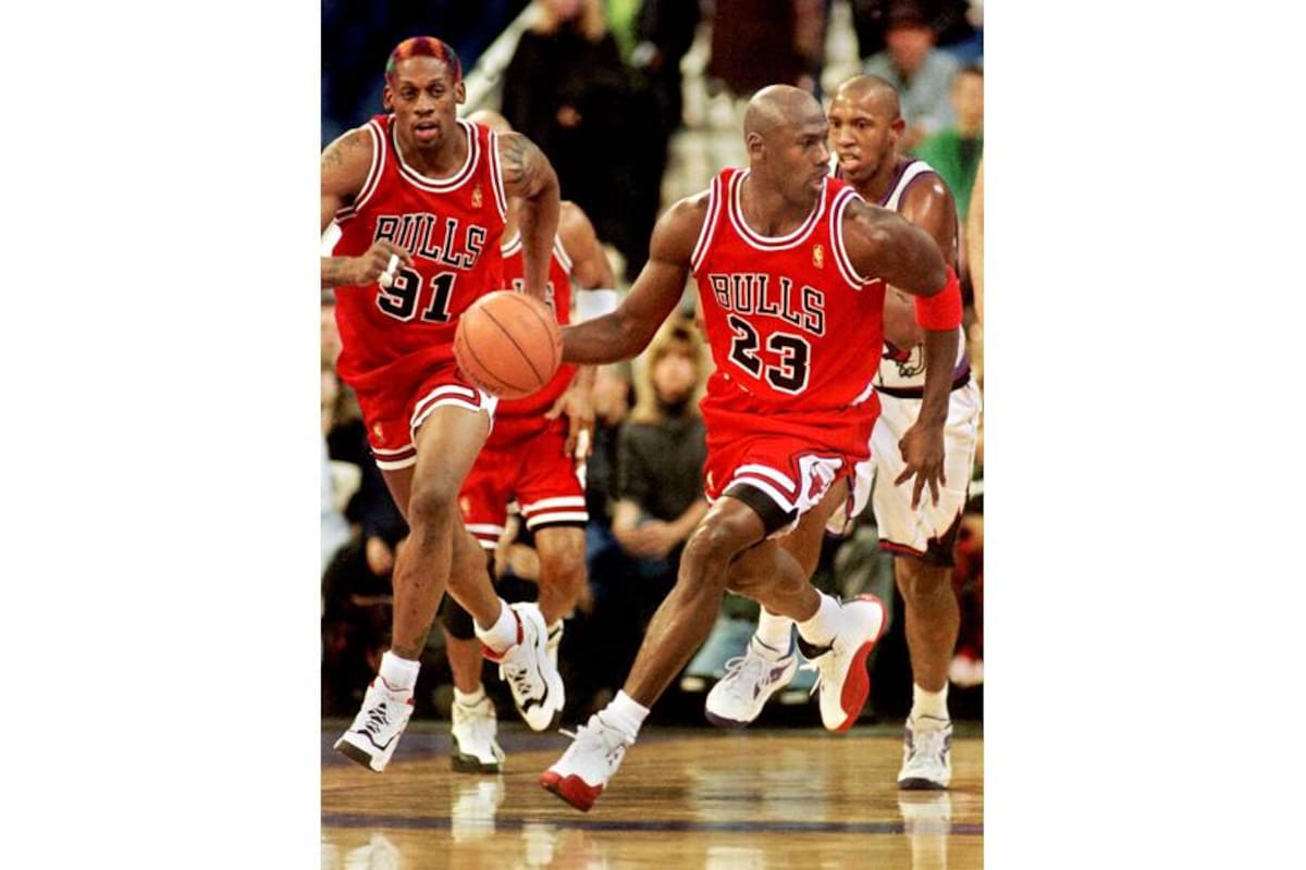 FREELANCE PHOTO: CHECK WITH NATIONAL POST FOR RIGHTS INFORMATION REGARDING THIS IMAGE
Toronto-01/12/99-Micheal Jordan and teamate Dennis Rodman play against the Raptors at the Dome last season. Photo by Carlo Allegri/NATIONAL POST (For Sports section - no reporter assigned)