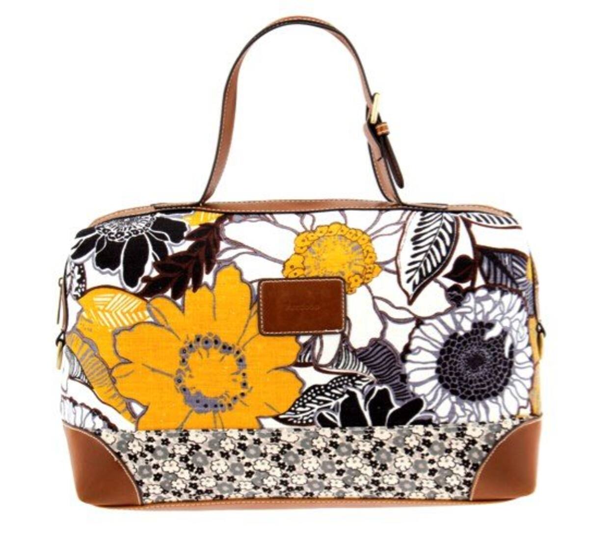 2. Un poco menos atrevido. Para quienes quieren ir despacio en la tendencia. El único protagonista: un florón amarillo. De Parfois: $89.900 (Foto: Revista Nueva/VANGUARDIA LIBERAL)