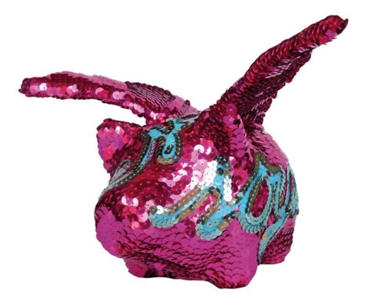 1.¡Este es el colmo de la sofisticación! El cerdito alado se viste de lentejuelas –hay en todos los colores- y nos propone convertirnos en ahorradoras con glamur. De OMG. $90.000 (Foto: Revista Nueva/VANGUARDIA LIBERAL)