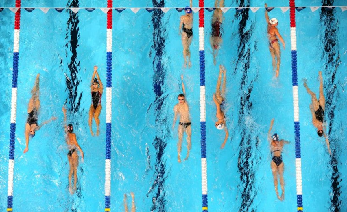 Nadadores hacen una sesión de calentamiento para una competición del equipo olímpico de natación norteamericano en Omaha (US). (Foto: AFP/VANGUARDIA LIBERAL)