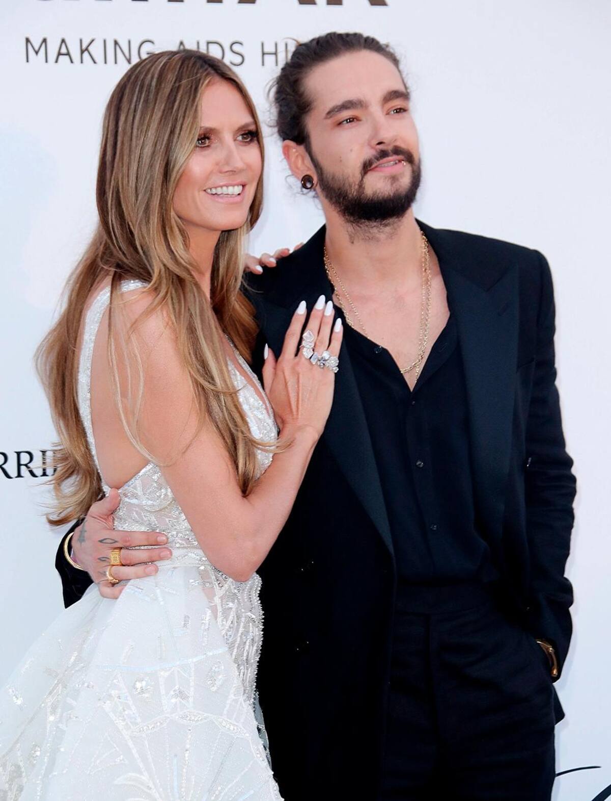 En una fiesta, la exmodelo de Victoria’s Secret, Heidi Klum y el músico Tom Kaulitz se conocieron y establecieron una conexión cercana, a pesar de la diferencia de edad de 16 años entre ellos. Heidi había estado previamente casada con el cantante británico Seal y habían tenido cuatro hijos juntos. Sin embargo, esto no impidió que ella decidiera casarse con el músico alemán en febrero del año siguiente después de haber apostado por el amor en 2018. Foto: EFE / VANGUARDIA