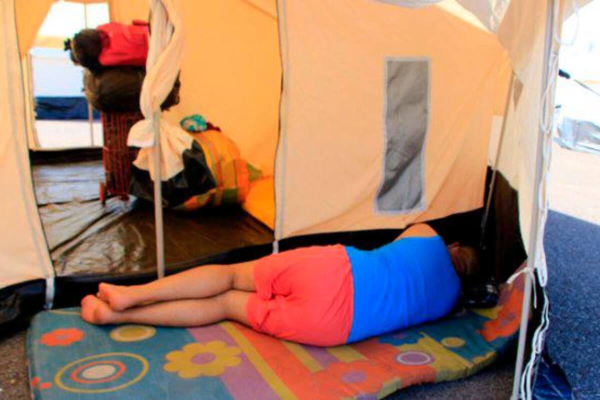 En el puente Tienditas está habilitado el centro temporal sanitario para que un grupo de migrantes limitado espere mientras se da el paso a Venezuela los días lunes, miércoles y viernes. (Foto: Tomada de La Opinión/VANGUARDIA)