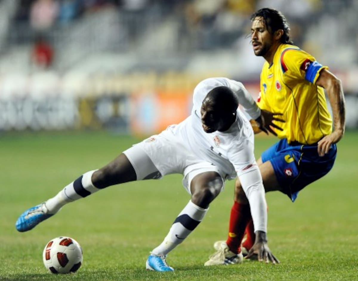 United States forward Jozy Altidore (17) avoids contact with Colombia defender Mario Yepes (3) in the second half of a friendly international men's soccer game, Tuesday, Oct. 12, 2010, in Chester, Pa. The game ended in a 0-0 tie. (AP Photo/Michael Perez)