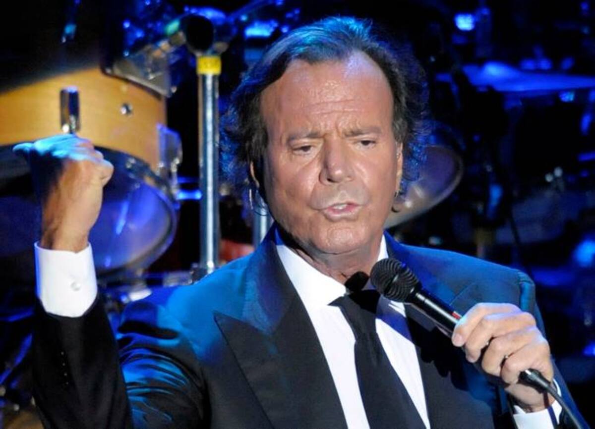 FILE - This is a Thursday, Aug. 14, 2008. file photo of Spanish singer Julio Iglesias as he performs during a concert at Cap Roig festival in Calella de Palafrugell, Spain. Spanish singer Julio Iglesias has married Dutch model Miranda Rijnsburger, his partner for the past 20 years. The 66-year-old singer announced the marriage in a statement to Spanish newspapers Friday Aug. 27, 2010. The wedding took place at the Virgen del Carmen church in the southern jet-set resort of Marbella. (AP Photo/Manu Fernandez. File)