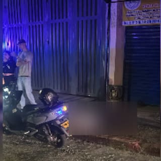Se detuvo porque su moto estaba baja de aire y sicarios lo acribillaron en Floridablanca