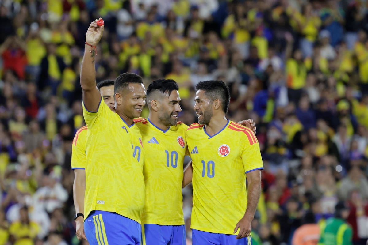 Bogota (Colombia), 22/08/2026.- Fredy Guarin (L) and Radamel Falcao (C) celebrate a goal during the 'Let's Lift Up Colombia' charity match to help those affected by the August 10 earthquake, at El Campin stadium in Bogota, Colombia, 21 August 2026. (Terremoto/sismo) EFE/EPA/Carlos Ortega
