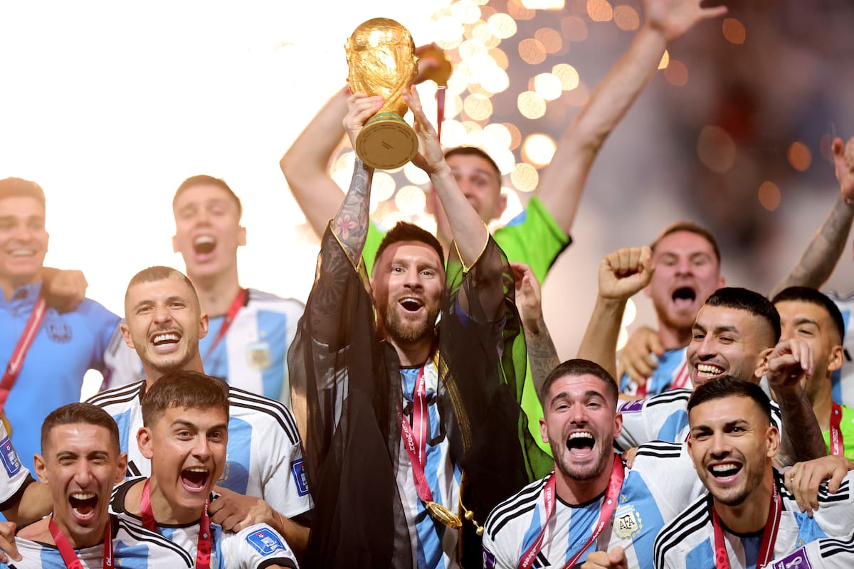 LUSAIL (Qatar), 31/08/2026.- (FILE) - Lionel Messi (C) of Argentina lifts the World Cup trophy after winning the FIFA World Cup 2022 Final between Argentina and France at Lusail stadium, Lusail, Qatar, 18 December 2022 (Reissued 31 August 2026). Lionel Messi announed his retirement from international soccer on 31 August 2026. (Mundial de Fútbol, Francia, Catar) EFE/EPA/FRIEDEMANN VOGEL