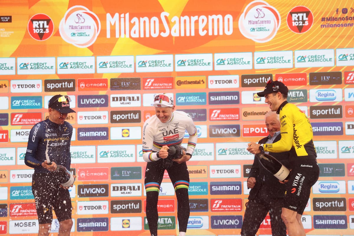 SANREMO (Italy), 21/03/2026.- (L-R) Second placed British rider Thomas Pidcock of team Pinarello Q36.5 Pro Cycling Team, winner Slovenian rider Tadej Pogacar of team UAE Team Emirates XRG, and third placed Belgian rider Wout van Aert of team Team Visma Lease a Bike celebrate on the podium after the Milano Sanremo cycling race over the 298km from Pavia to Sanremo, Italy, 21 March 2026. (Ciclismo, Italia) EFE/EPA/ROBERTO BETTINI
