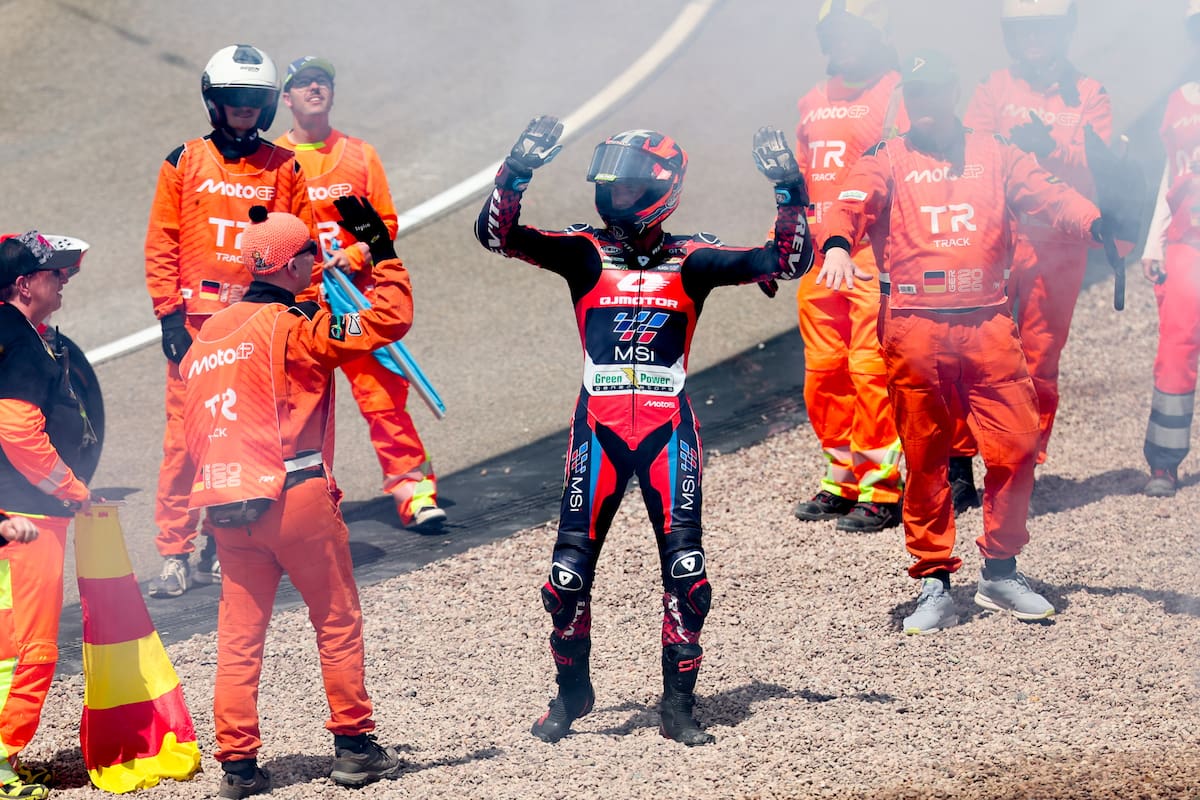 Hohenstein-Ernstthal (Germany), 12/07/2026.- Spanish Moto2 rider Ivan Ortola of QJMOTOR-Exocom-MSI celebrates after winning the Moto2 race of the motorcycling Grand Prix of Germany, at the Sachsenring racing circuit in Hohenstein-Ernstthal, Germany, 12 July 2026. (Motociclismo, Alemania) EFE/EPA/FILIP SINGER