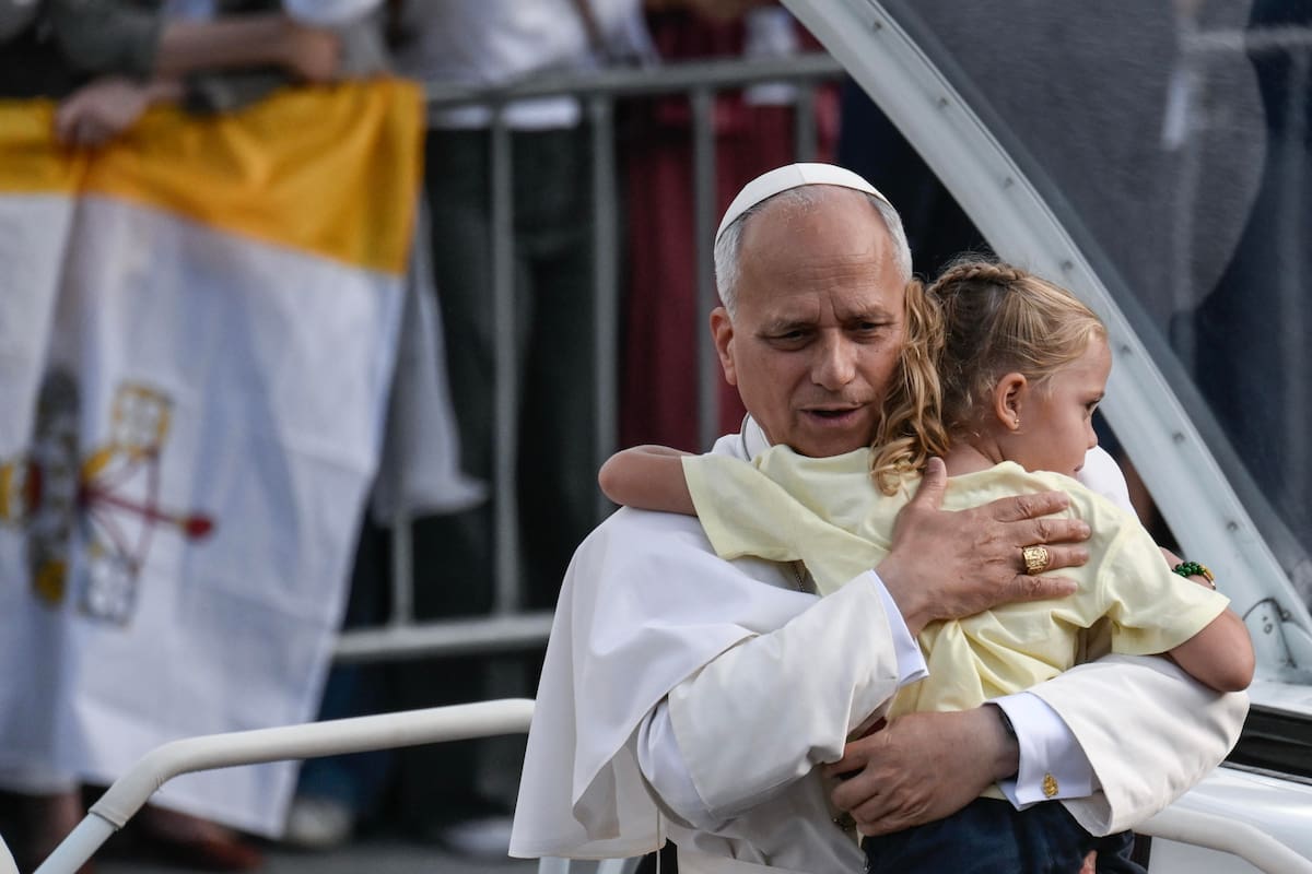Barcelona (Spain), 09/06/2026.- Pope Leo XIV hugs a child at a prayer vigil at the Lluis Companys Olympic Stadium in Barcelona, Spain, 09 June 2026. Pope Leo XIV is visiting Spain from 06 to 12 June 2026, with stops in Madrid, Barcelona and the Canary Islands. (Papa, España) EFE/EPA/CIRO FUSCO