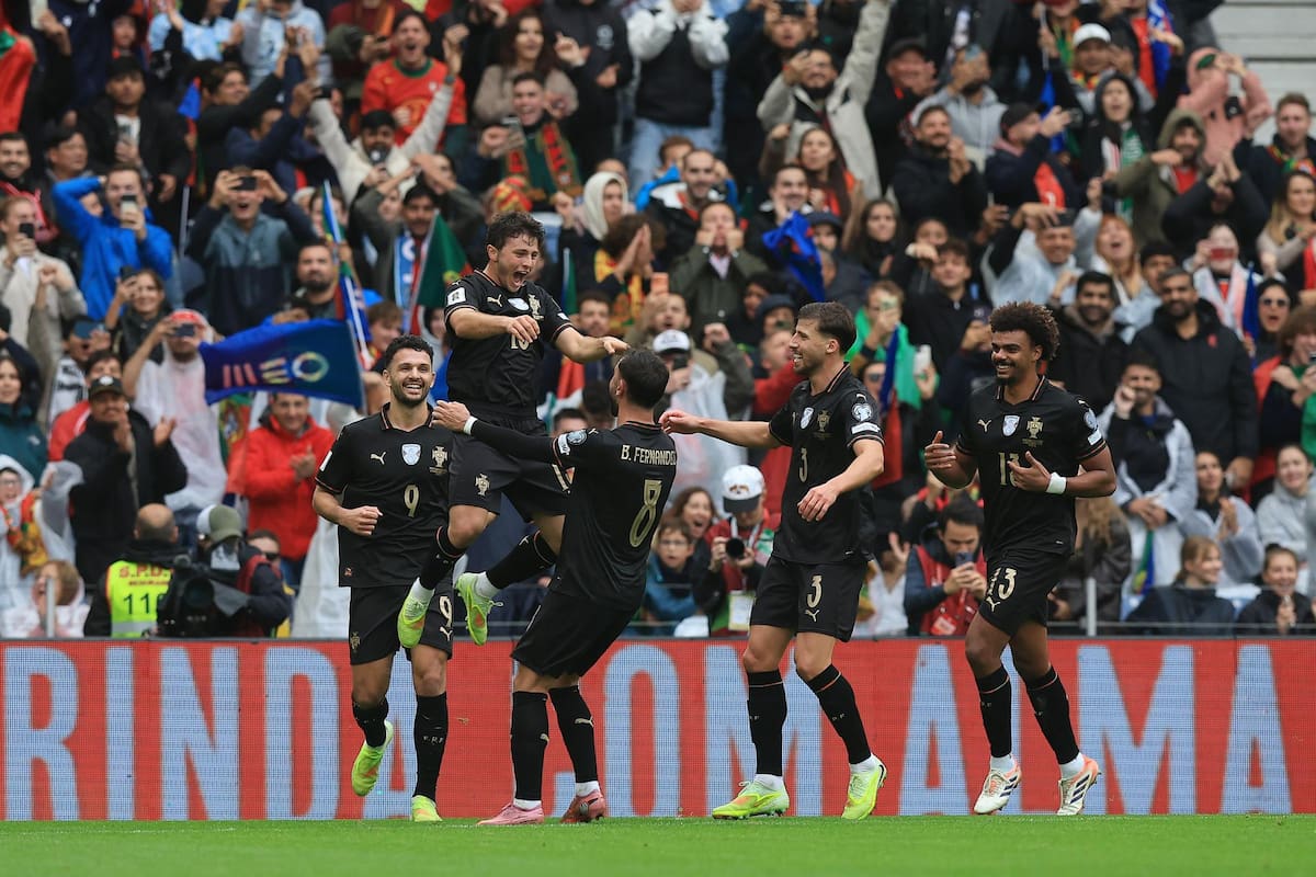 Portugal player Joao Neves Veiga (2-L) celebrates with his teammates after scoring a goal against Armenia during the FIFA World Cup 26 qualifier soccer match held at Dragao Stadium, in Porto, Portugal, 16 November 2025. (Mundial de Fútbol) EFE/EPA/ESTELA SILVA