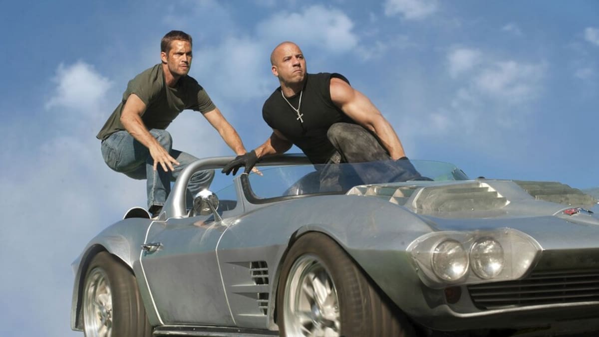 El cuarteto que lo inició todo: Vin Diesel, Michelle Rodríguez, Jordana Brewster y Paul Walker en el año 2001, durante el rodaje de la primera película que cambió la cultura automotriz global.