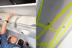 En video quedó el momento en que pasajeros sostienen el techo de un avión en pleno vuelo