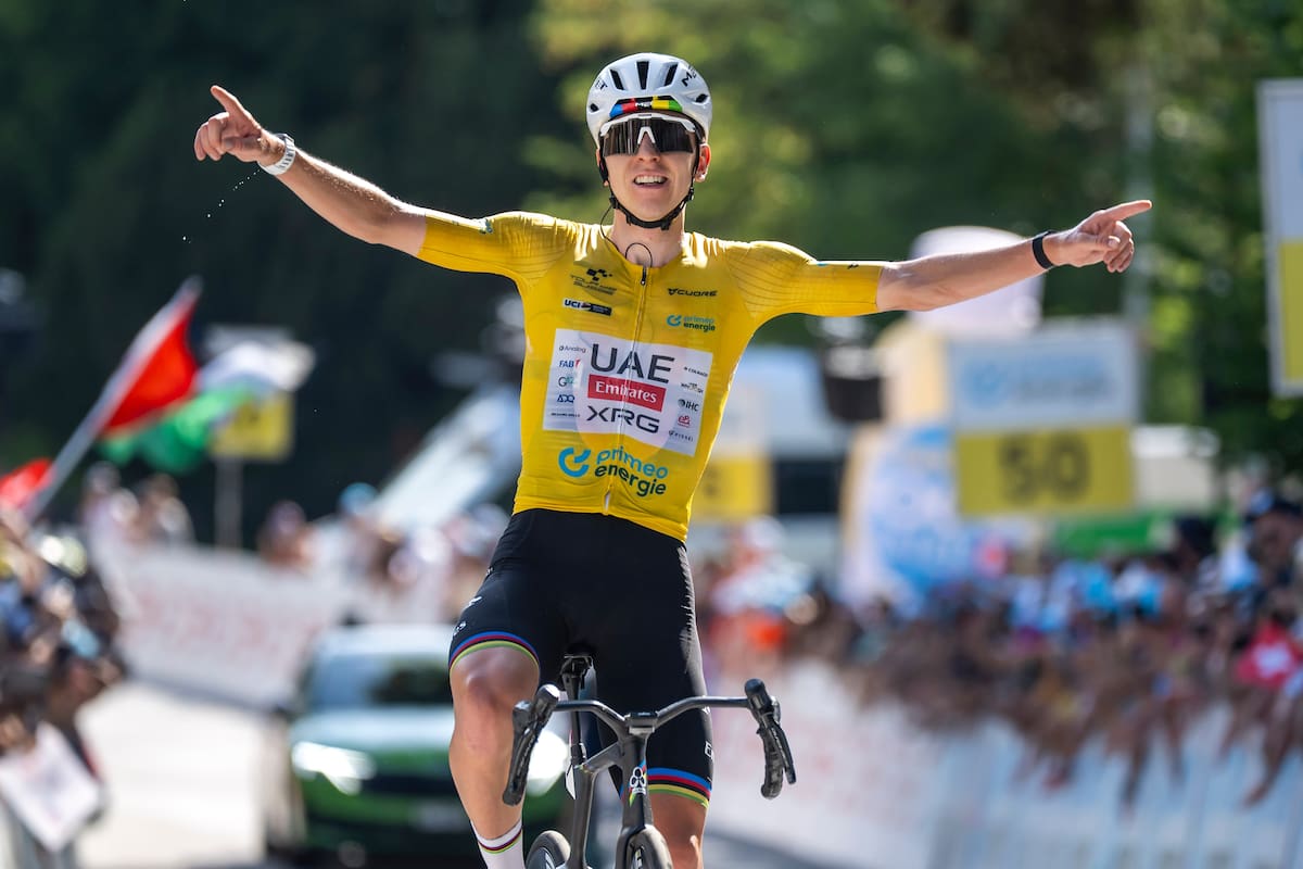 VILLARS-SUR-OLLON (Switzerland), 21/06/2026.- Slovenia cyclist Tadej Pogacar (L) of UAE Team Emirates-XRG, wearing the yellow leaders jersey, crosses the finish line to win the fifth and final stage of the Tour de Suisse cycling race, a 151 km race that starts and finishes in Villars-sur-Ollon, Switzerland, 21 June 2026. (Ciclismo, Eslovenia, Suiza) EFE/EPA/GIAN EHRENZELLER