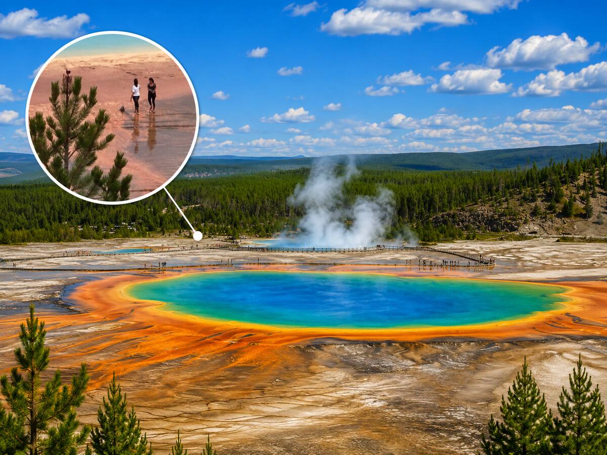 Dos turistas desafían las normas y caminan fuera de los senderos en Yellowstone.