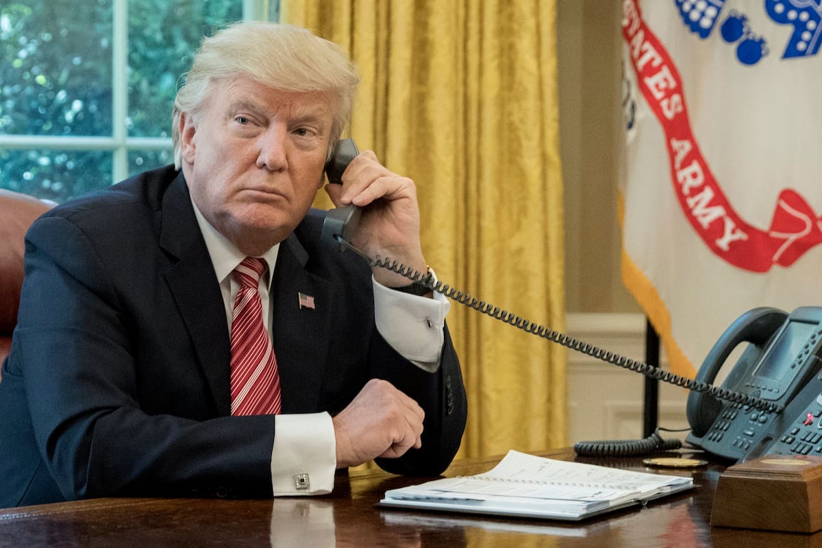 epa06052937 US President Donald J. Trump makes a phone call to Prime Minister of Ireland to Leo Varadkar in the Oval Office of the White House in Washington, DC, USA, 27 June 2017. EPA/MICHAEL REYNOLDS