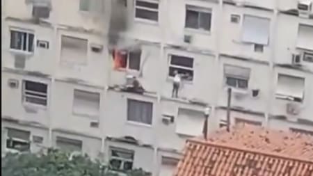 Video muestra cómo una mujer escapó de un incendio por la ventana de un edificio en Brasil