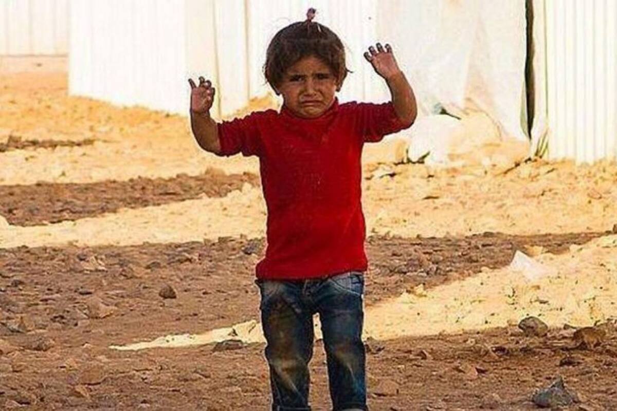 Otra niña siria se "rinde" ante una una cámara de fotos (Foto: TOMADO DE INFOBAE.COM/VANGUARDIA LIBERAL)