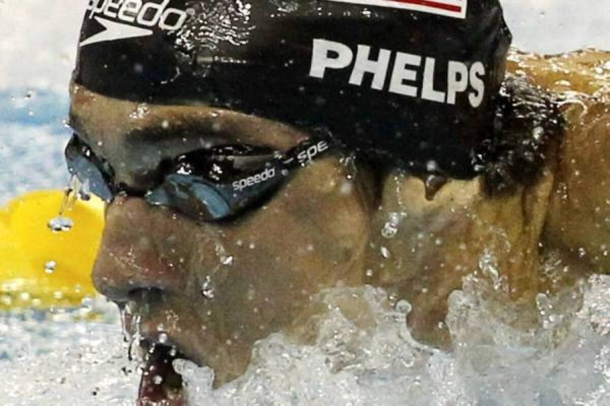El estadounidense Michael Phelps durante la prueba de los 100m mariposa donde consiguió su tercera medallaa de oro.(Foto: Efe / VANGUARDIA LIBERAL)