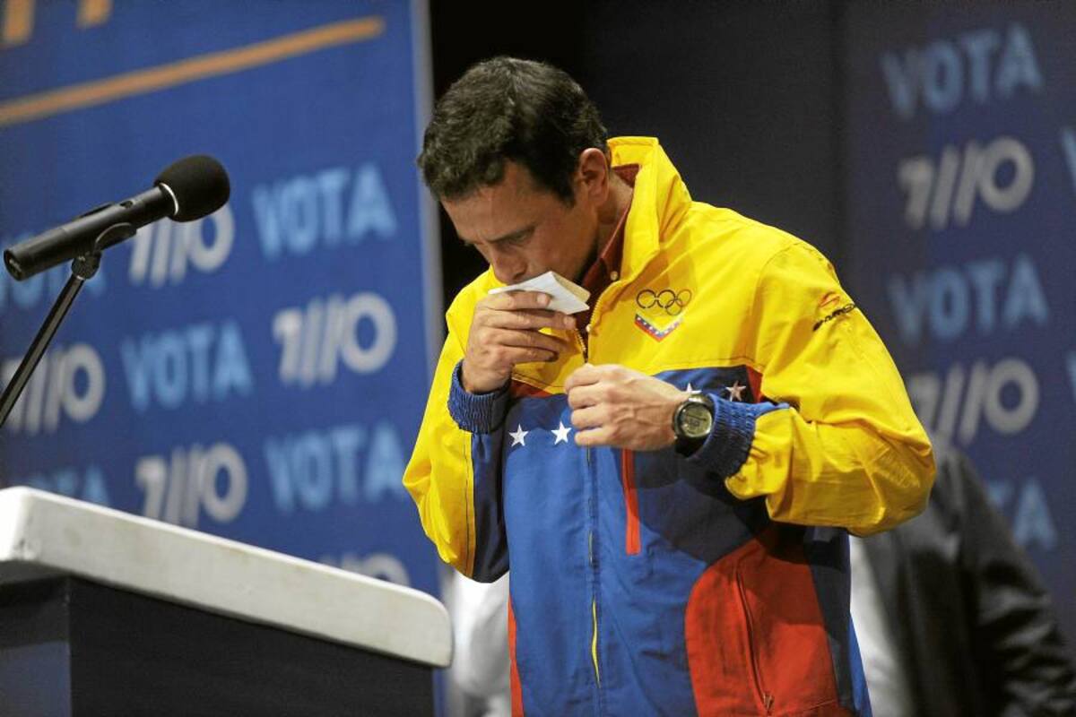 Capriles felicita a Chávez por su victoria en las elecciones venezolanas (Foto: Afp/VanguardiaLiberal)