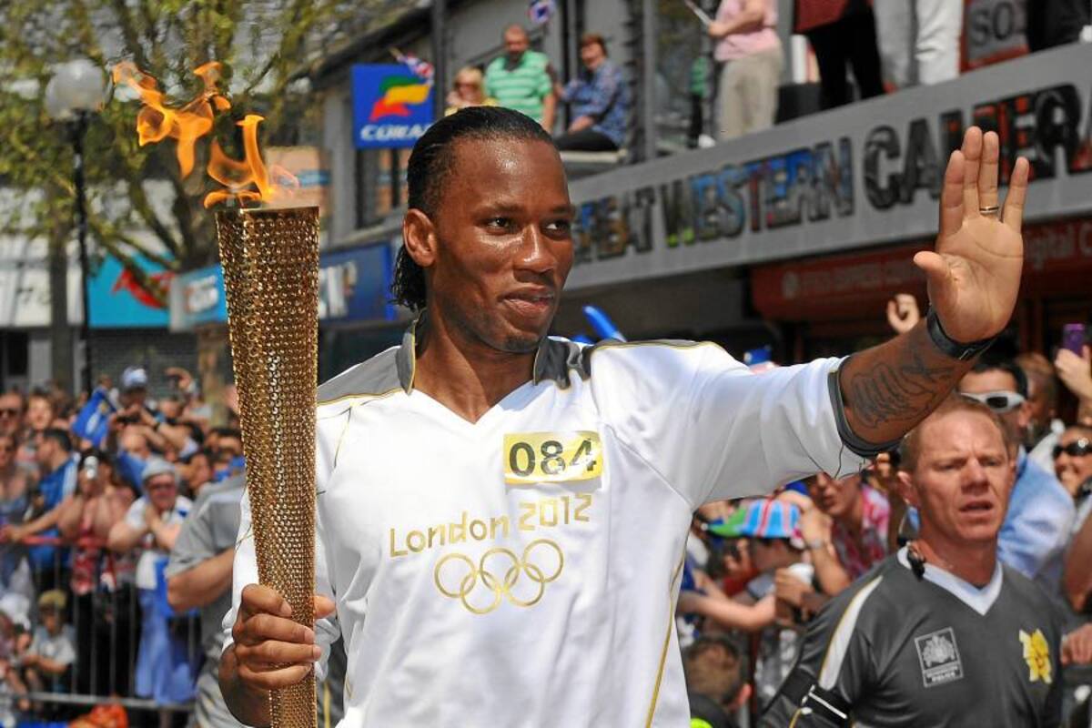 Drogba, ovacionado al hacer un relevo de la antorcha olímpica (Foto: Tomado de Internet/ VANGUARDIA LIBERAL)