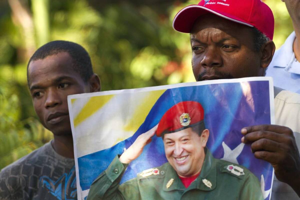 Dominicanos rezan en santuario Virgen de la Altagracia por salud de Chávez (Foto: AFP/VANGUARDIA LIBERAL)