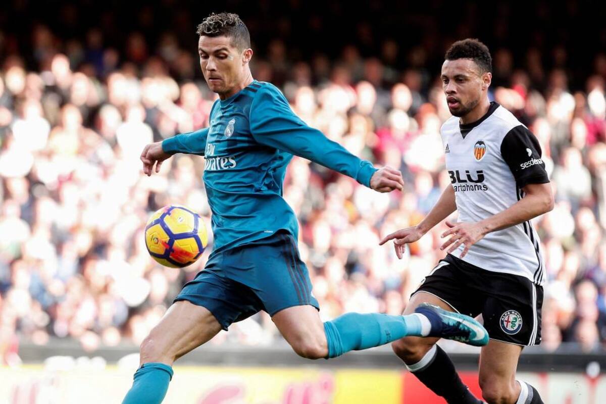 Cristiano Ronaldo marcó dos tantos, de penalti, en la victoria 4-1 de Real Madrid sobrel el Valencia, que le permite al elenco ‘merengue’ apagar la crisis de resultados. (Foto: EFE /VANGUARDIA LIBERAL)