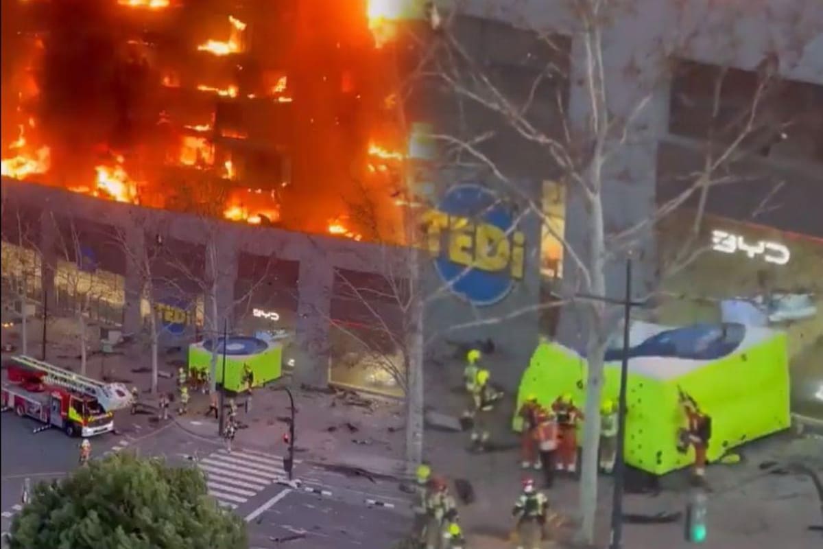 Bombero saltó a colchón de rescate tras ser alcanzado por las llamas del incendio en edificio de España Foto: Redes sociales/Vanguardia.